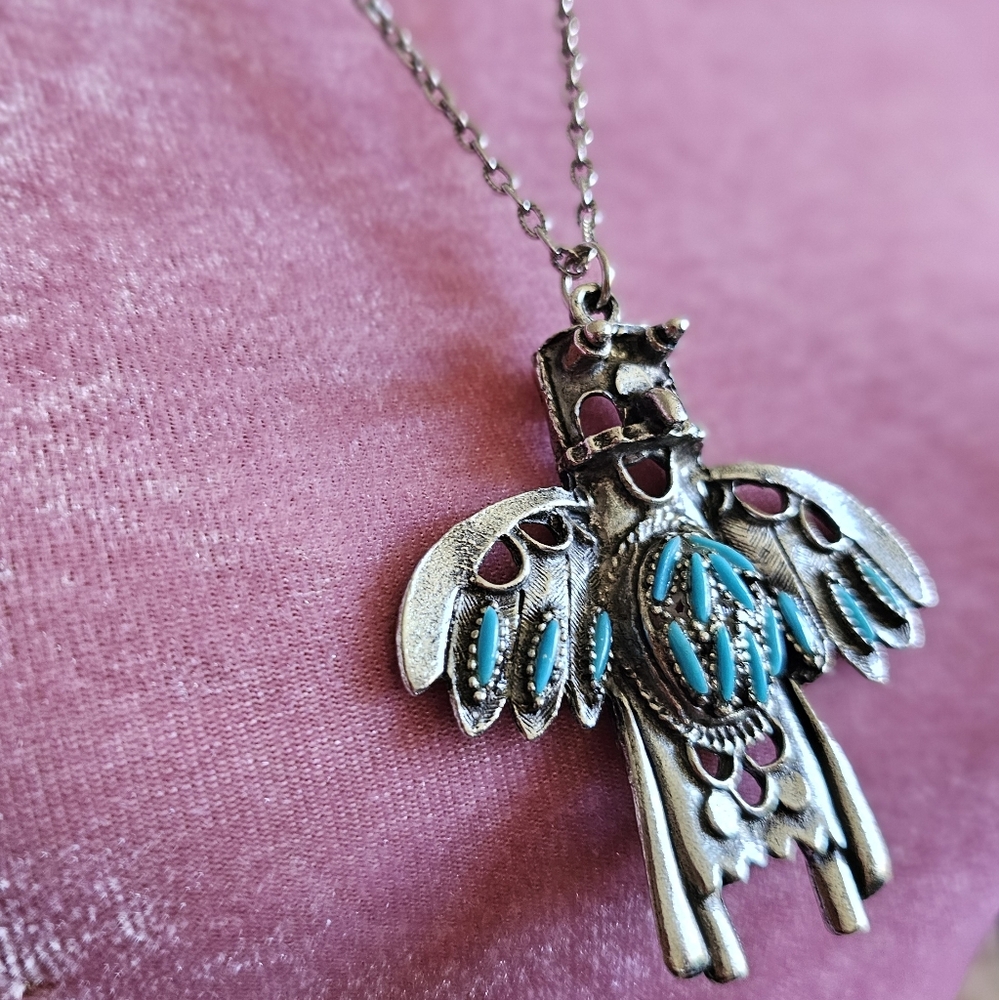 Vintage 70's Kachina pendant. Silver tone metal and faux turquoise.